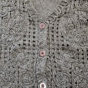 Delicate Knit Vest. with Button Detail